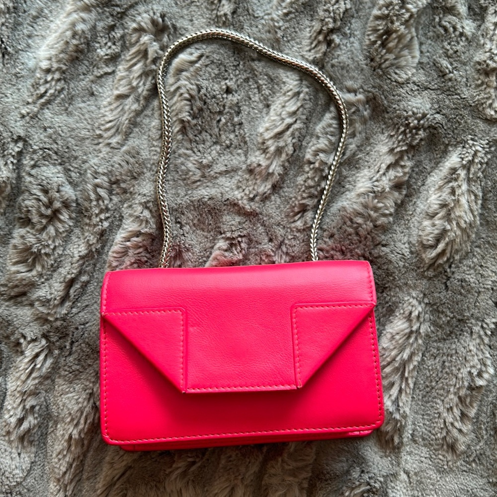 Fuchsia leather Saint Laurent Mini Betty bag with silver-tone hardware.